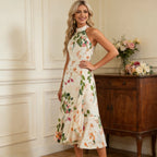 Sommerliches Cocktailkleid mit Blumenmuster Neckholder und Volant-Saum Midi