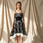 Gothic Cocktailkleid in Schwarz-Weiß mit Herz-Ausschnitt und Vokuhila-Spitzenrock