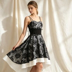 Gothic Cocktailkleid in Schwarz-Weiß mit Herz-Ausschnitt und Vokuhila-Spitzenrock
