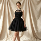 Festliches Cocktailkleid in Schwarz mit Neckholder, Glitzer-Dekor und weiter A-Linie